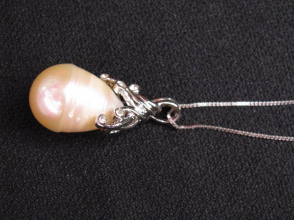 Appraisal: Natural cultured water-drop shape pink pearl necklace mm by mm