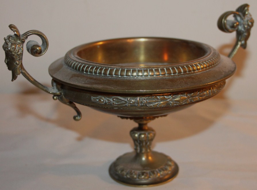 Appraisal: A bronze Barbadienne style tazza and a brass bowl