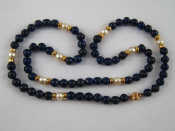 Appraisal: A lapis lazuli and cultured pearl necklace with a yellow