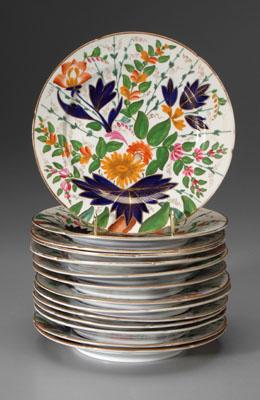 Appraisal: Set of ironstone plates similar hand-decorated floral bouquets with rich