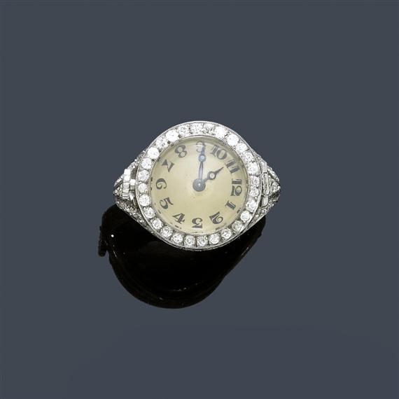 Appraisal: A DIAMOND RING WITH A WATCH circa Platinum Attractive ring