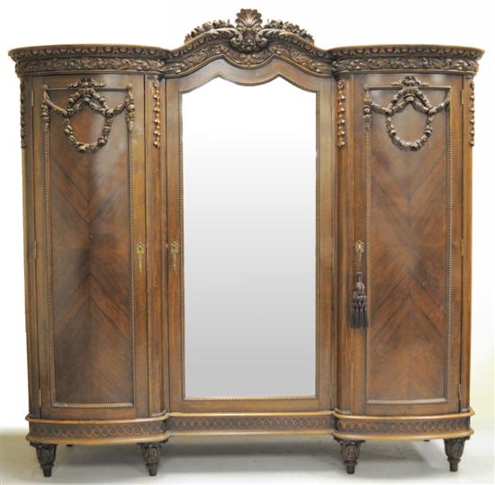 Appraisal: Rococo style armoire multi wood excellent detail to carvings three