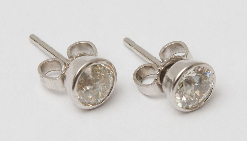 Appraisal: PAIR OF K WHITE GOLD AND DIAMOND EARRINGS Stud style