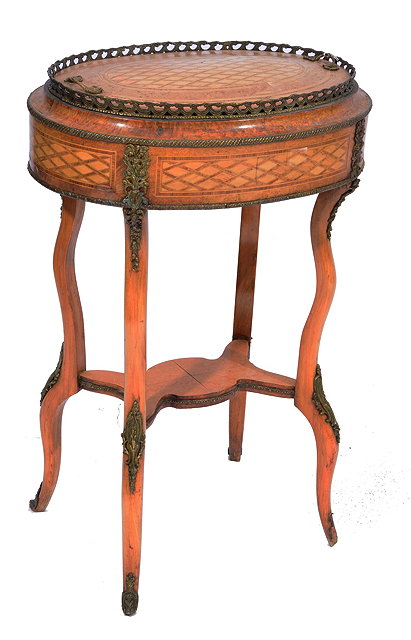 Appraisal: A FRENCH BURR WALNUT AND MARQUETRY DECORATED OVAL JARDINIERE with