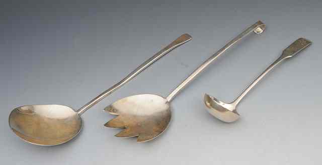 Appraisal: A SCOTTISH SMALL LADLE with oar shaped handle marks for