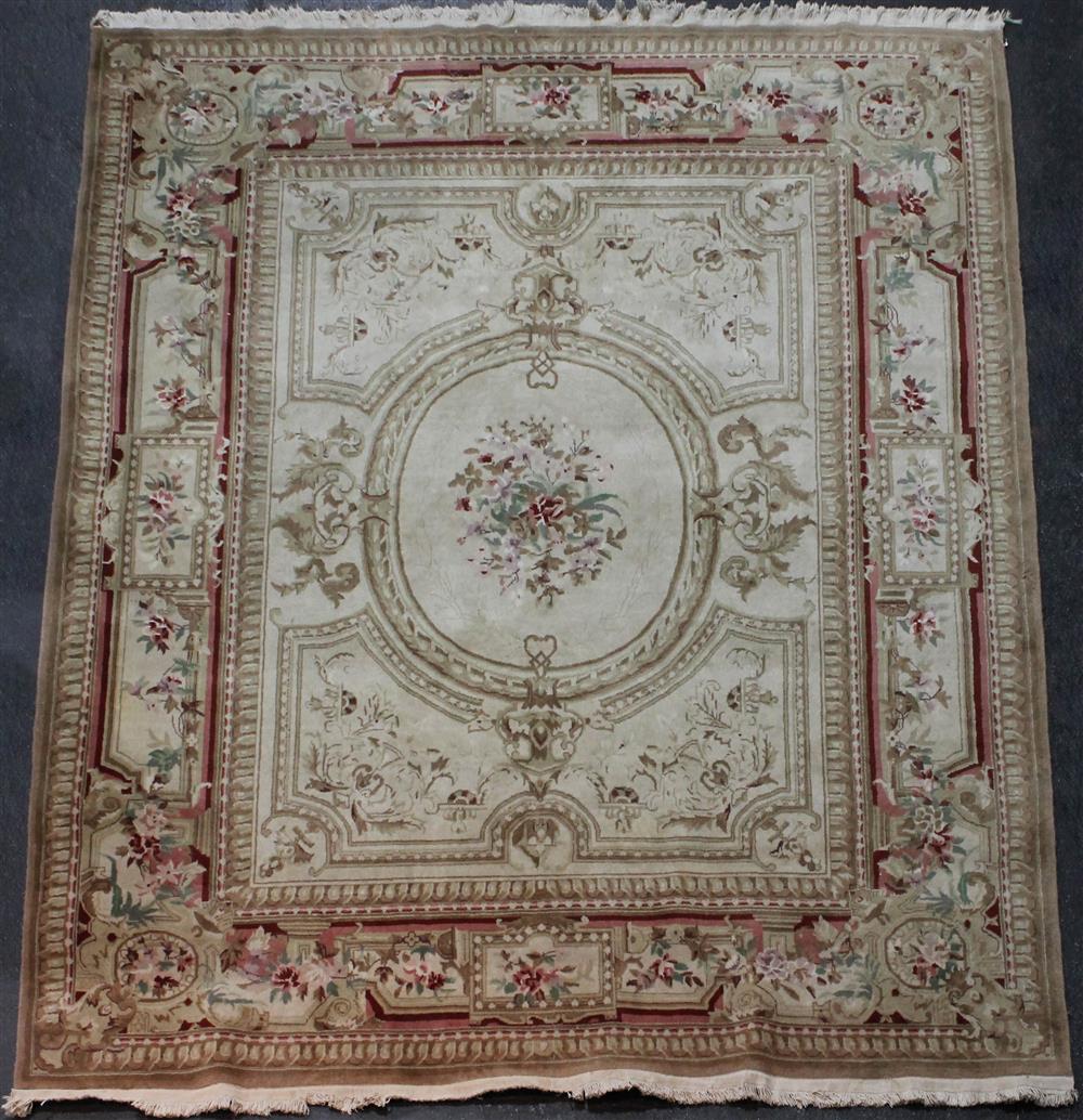 Appraisal: LARGE BEIGE AUBUSSON WOOL RUG having an ivory field with