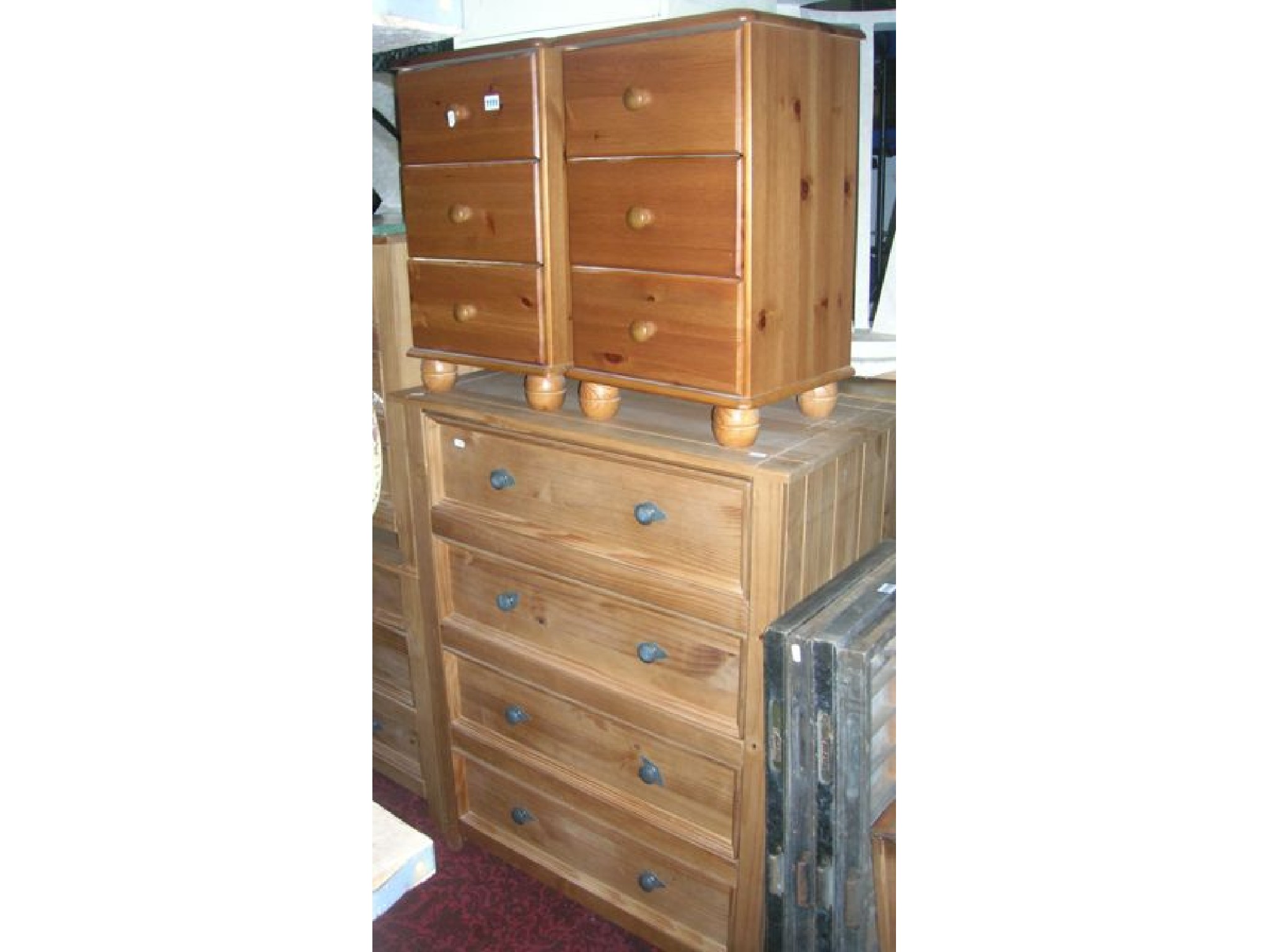 Appraisal: A contemporary pine bedroom chest of four long drawers together