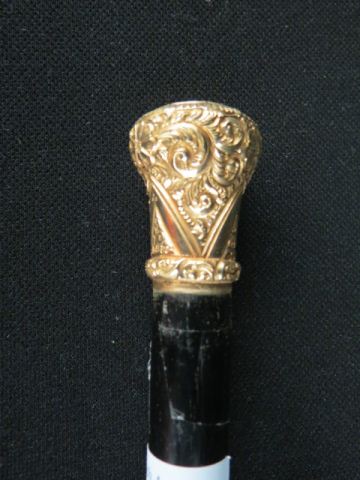 Appraisal: Gold-Filled Top Walking Stick elaborate design circa long