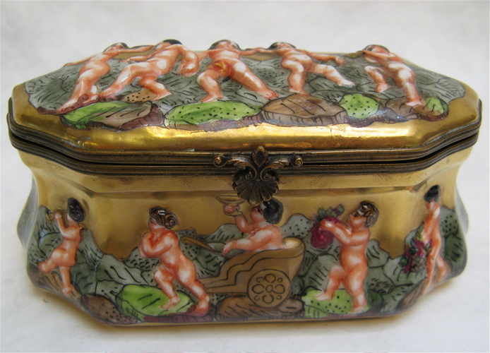 Appraisal: FRENCH TH CENTURY PORCELAIN VALUABLES BOX raised cherubs in the