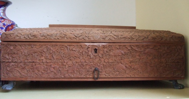 Appraisal: An Indian carved wooden writing slope vanity box late th