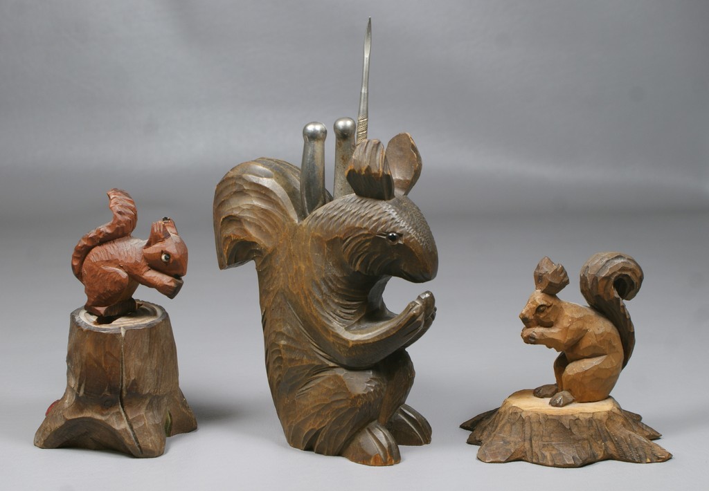 Appraisal: Black Forest Carved Wood squirrels one with nutcracker and pick