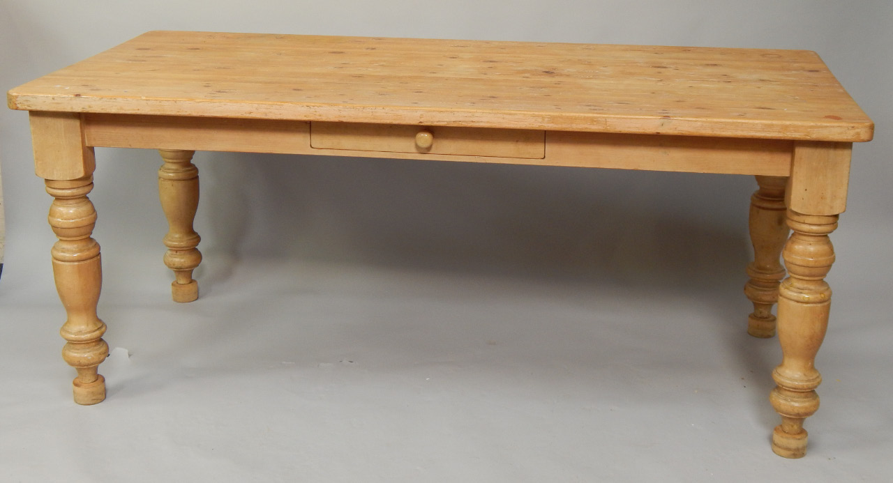 Appraisal: A pine dining table on turned baluster legs cm x