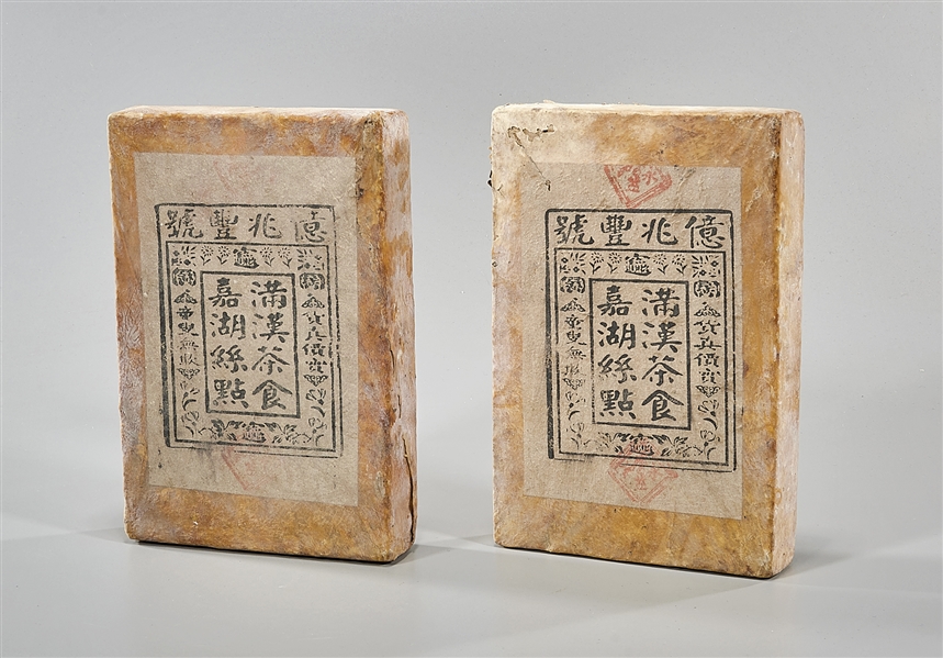 Appraisal: Two Chinese compressed tea bricks x x each approx