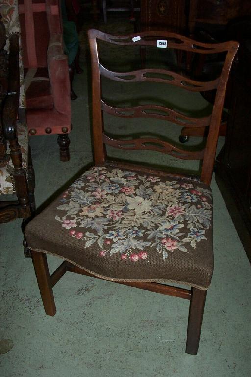 Appraisal: A pair of Georgian mahogany ladder back chairs in a