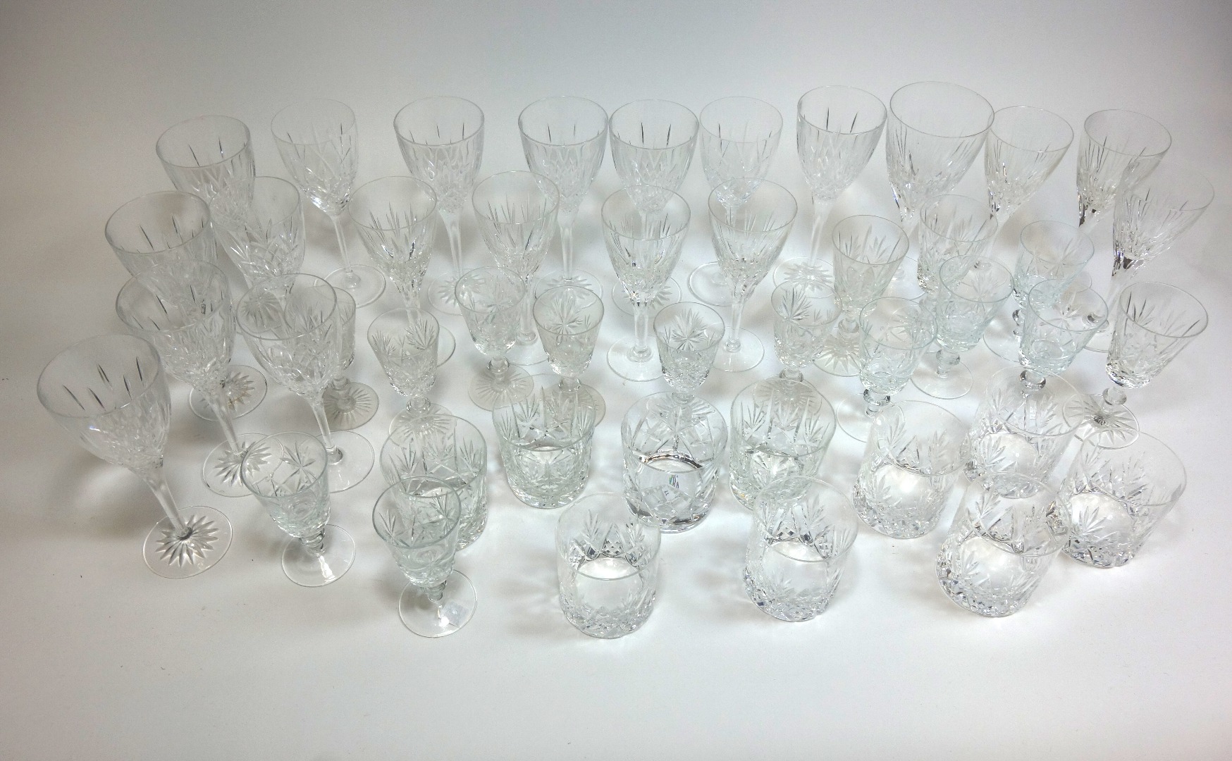 Appraisal: A large collection of cut pattern drinking glasses in sets