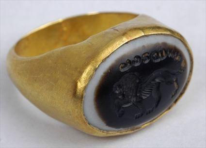 Appraisal: PERSIAN AGATE INTAGLIO OF A LION SET IN A GOLD