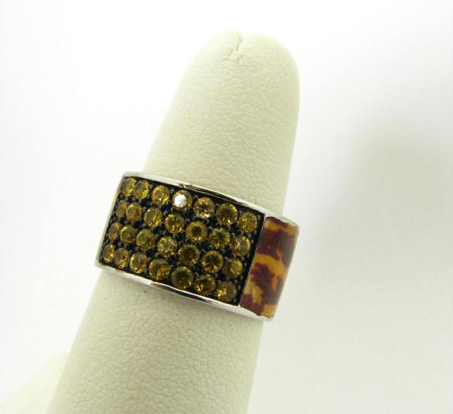 Appraisal: Danuta sterling silver enamel leopard print band ring with yellow