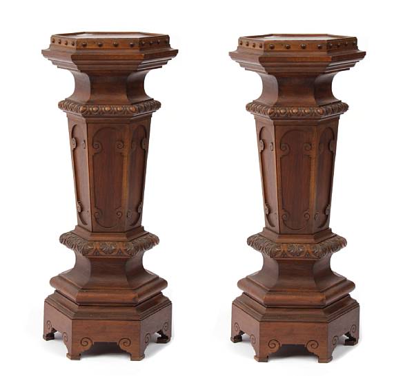 Appraisal: A pair of Baroque style mixed wood pedestals height in