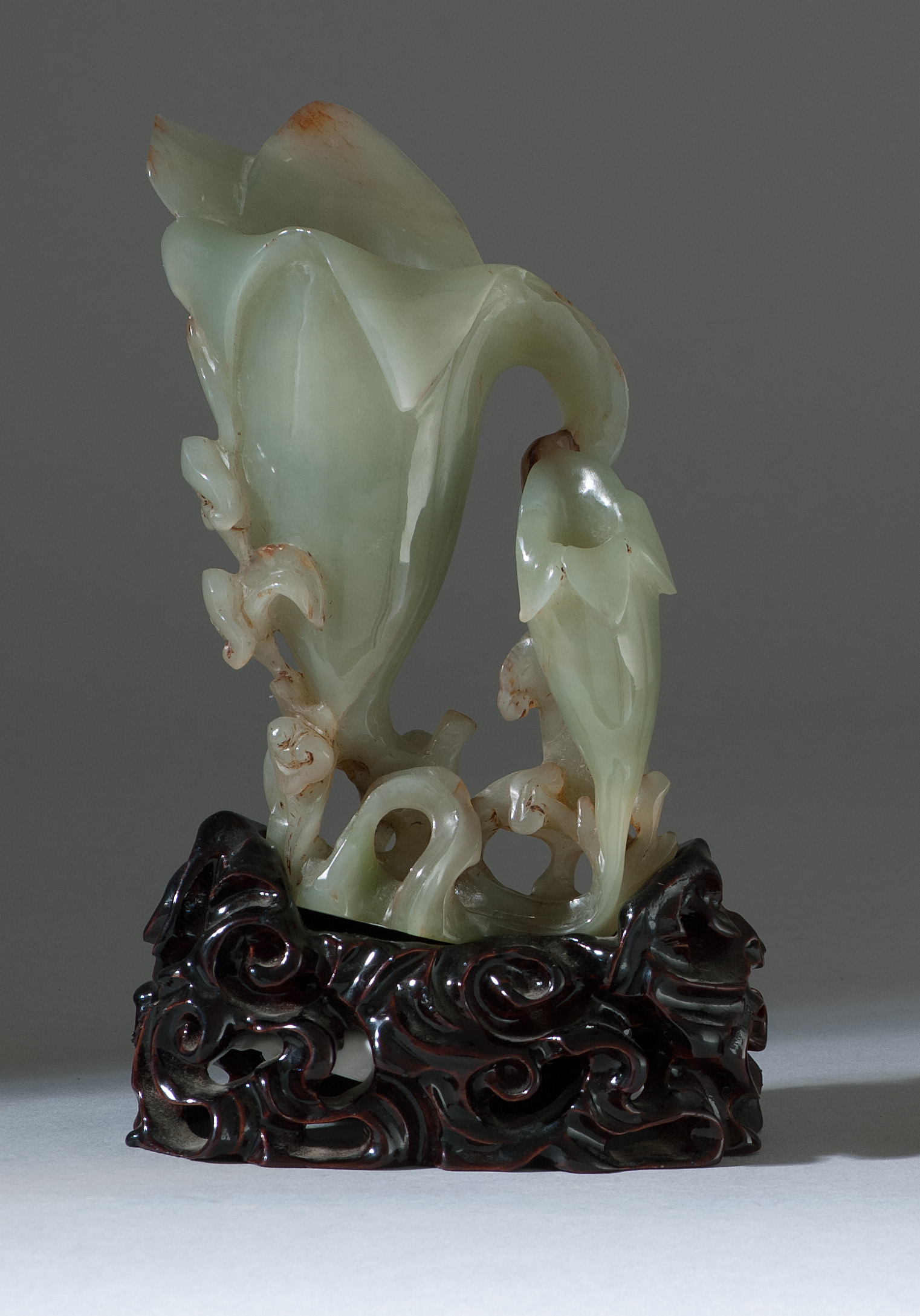 Appraisal: CELADON JADE VASE In the form of two trumpet-form flowers