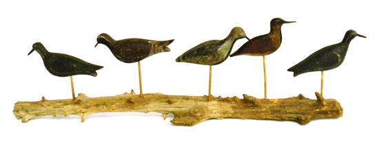 Appraisal: DECOYS Five hand carved and painted shorebird stick-up decoys from