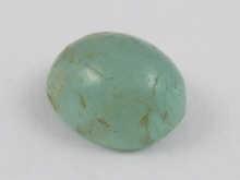 Appraisal: A loose polished cabochon emerald approx mm x mm carats