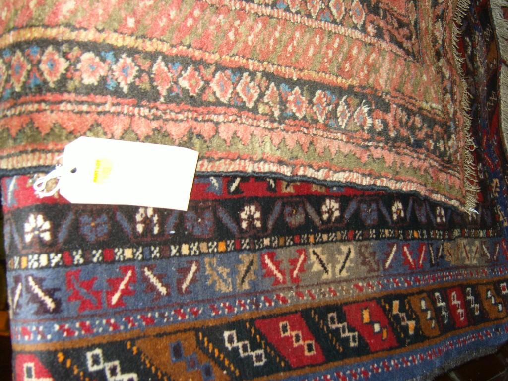 Appraisal: Two eastern wool rugs one with repeating motifs on a