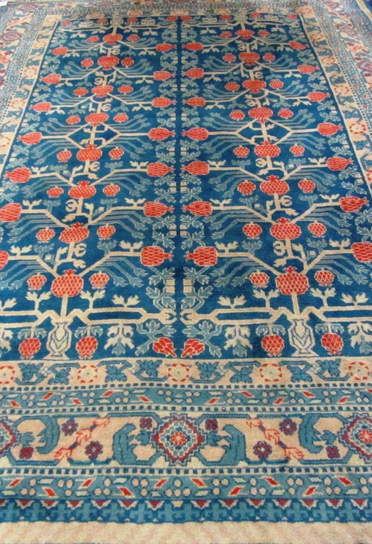 Appraisal: A Khotan carpet the petrol blue field with an allover