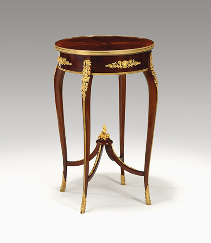 Appraisal: Transitional style gilt-bronze mounted mahogany and tulipwood gueridon th century