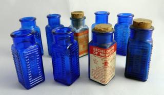 Appraisal: cobalt Poison bottles Poison- square cobalt panels embossed with horizontal