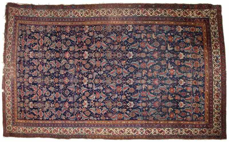 Appraisal: Antique Sultanabad Oriental Rugdark blue field Herati pattern borders in