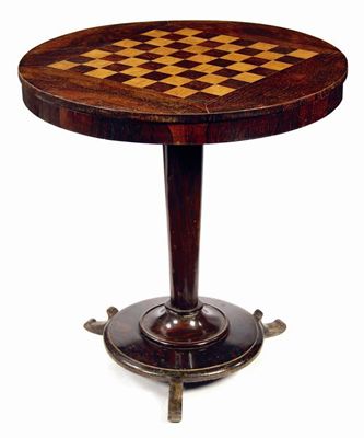 Appraisal: A Victorian rosewood and simulated games table the tilt-top inlaid