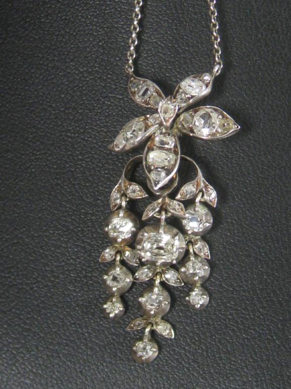 Appraisal: A Victorian Diamond Pendant the circular and rose-cut stones pave-set