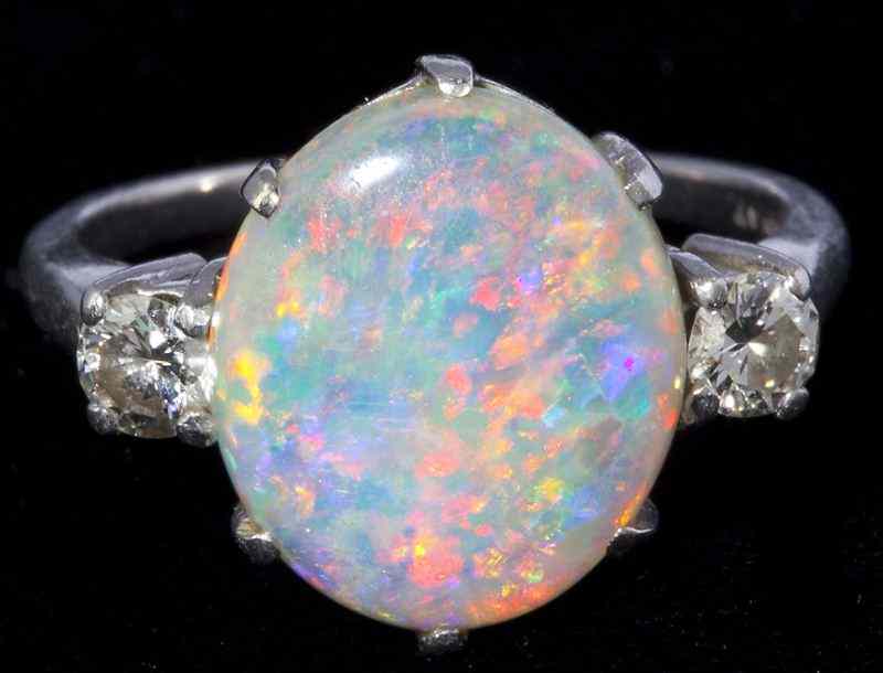 Appraisal: Platinum Opal and Diamond Ringcentering on one opal approximately carat