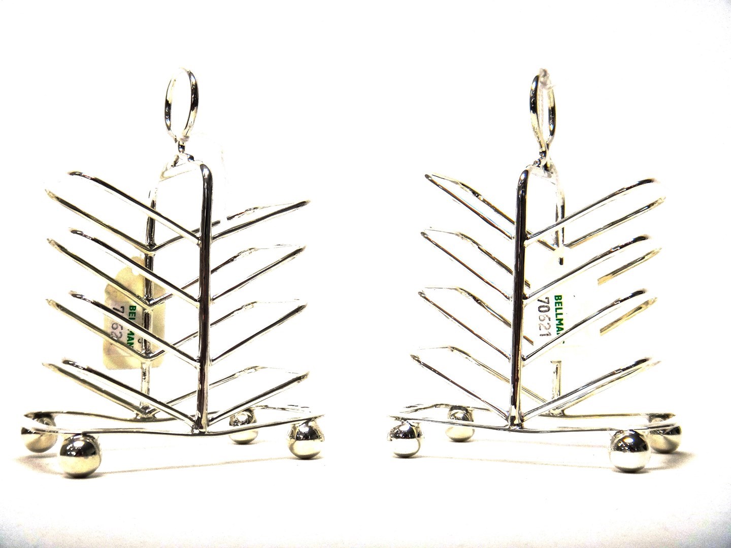 Appraisal: A pair of silver double sided toastracks each with a