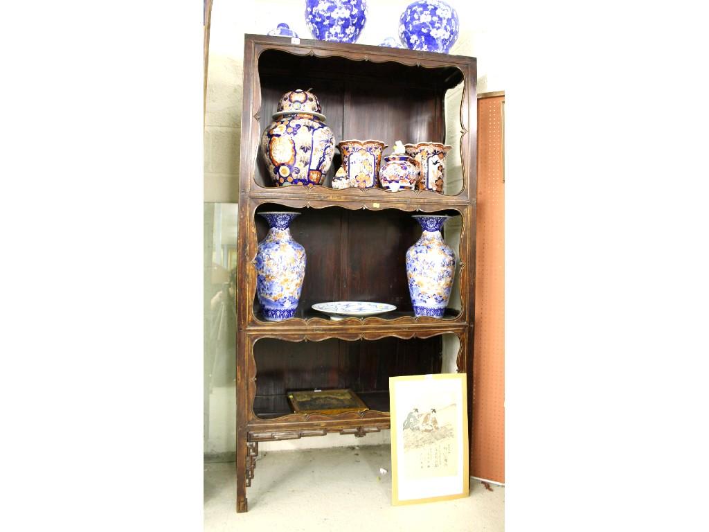 Appraisal: Set of late th century hardwood three tier Chinese bookshelves