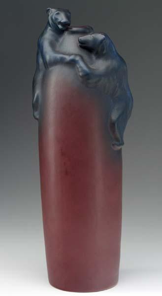 Appraisal: VAN BRIGGLE Bottle-shaped vase with two climbing bears perched at