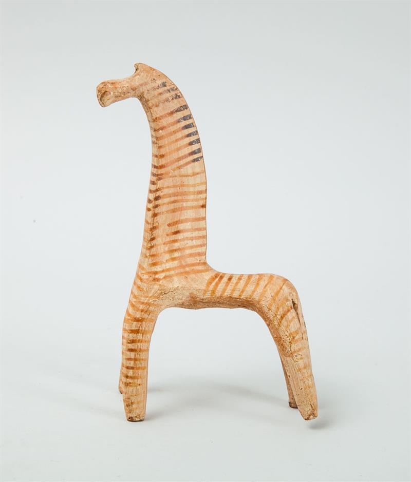 Appraisal: BOEOTIAN PAINTED TERRACOTTA FIGURE OF A GIRAFFE Standing four square