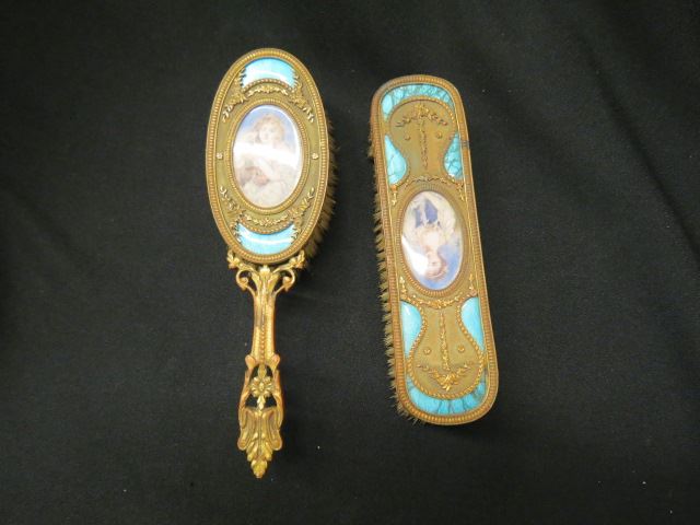 Appraisal: Pair of French Brushes with Miniature Paintings on ivory maidens