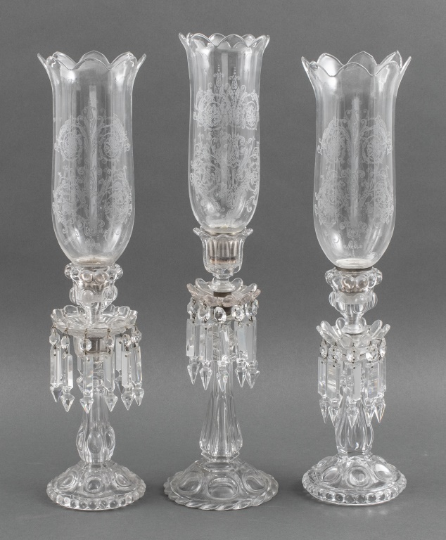 Appraisal: BACCARAT HURRICANE CRYSTAL GLASS CANDLESTICKS Three Baccarat hurricane crystal glass