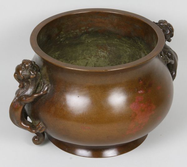 Appraisal: Late th-early th Century Chinese bronze censer with dragon handles