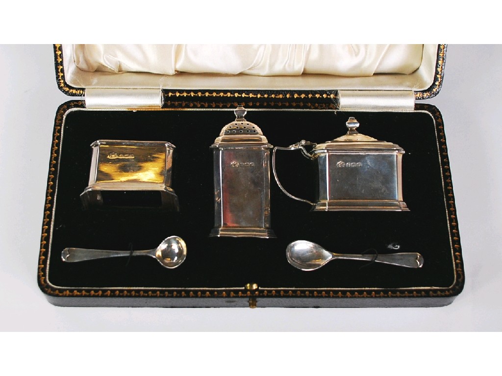 Appraisal: GEORGE VI CASED THREE PIECE SILVER CONDIMENT SET by Elkington