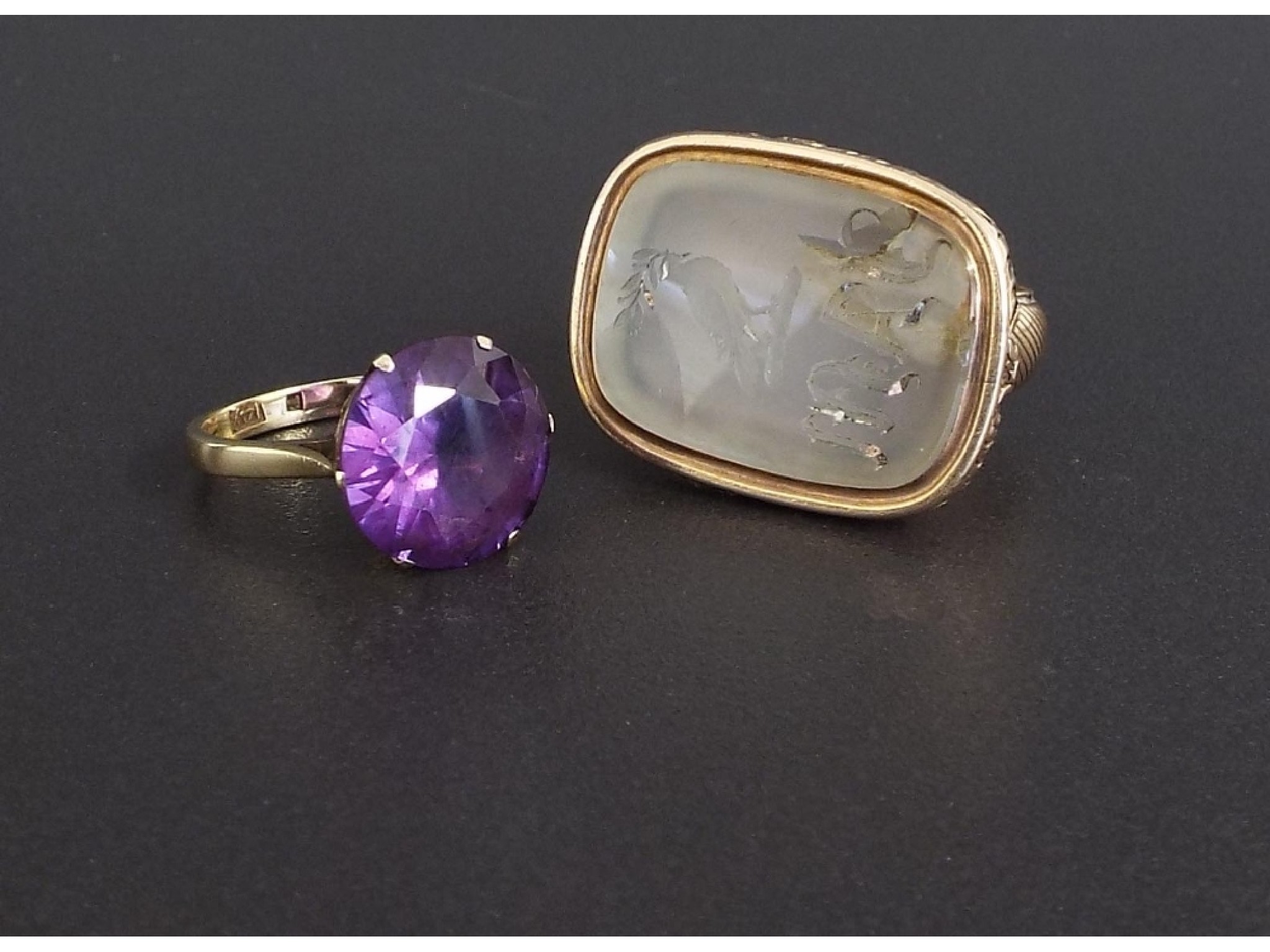 Appraisal: k synthetic corundum single stone ring mm diameter together with