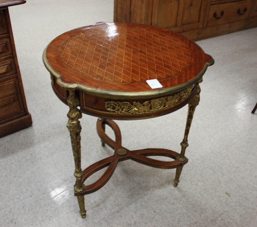 Appraisal: LOUIS XVI-STYLE LAMP TABLE having a round parquetry top on