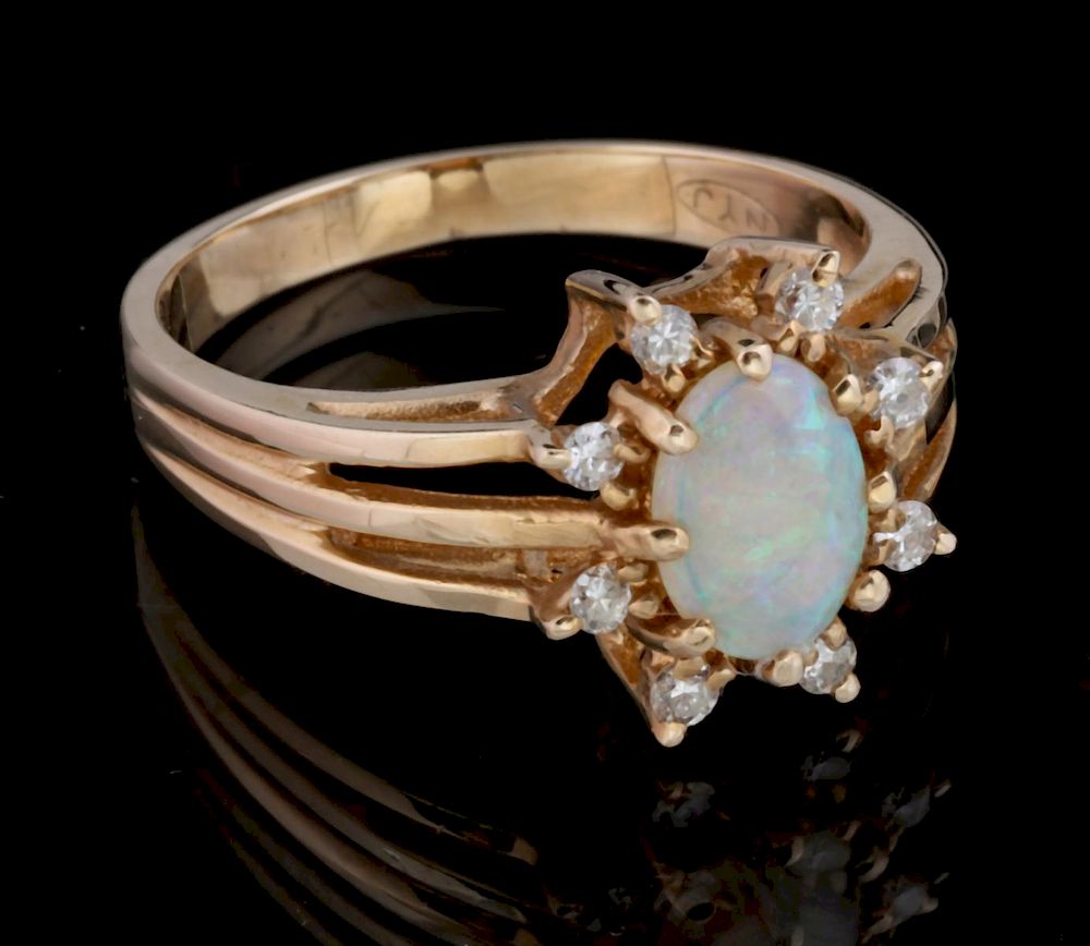 Appraisal: A LADIES' K GOLD DIAMOND AND OPAL FASHION RING A