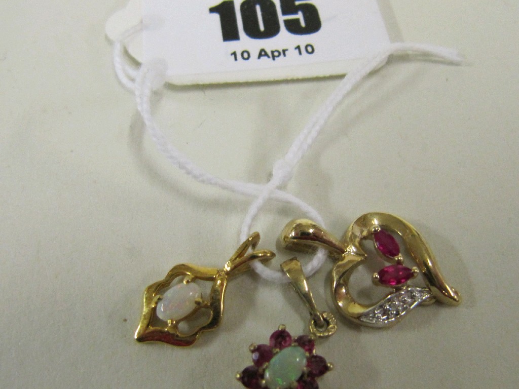 Appraisal: Lot comprising ct gold opal and ruby cluster pendant ct