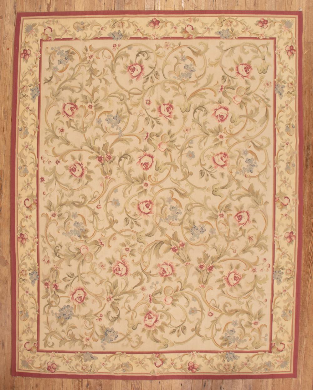 Appraisal: Aubusson Carpet cream ground floral design in red blue and