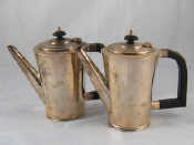 Appraisal: A pair of Art Deco silver hot milk or water