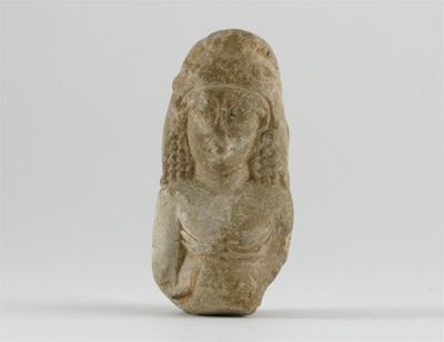 Appraisal: A Middle Eastern stone carving of a bust with braided