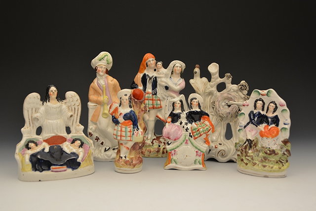 Appraisal: A group of seven Staffordshire groupsVictorian largest cm