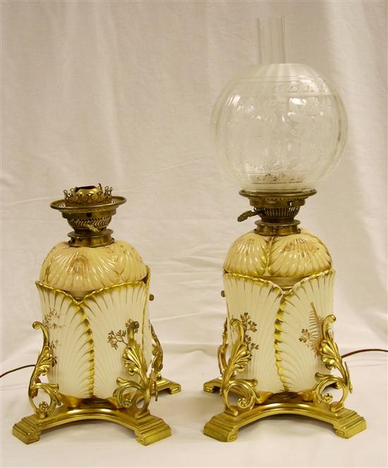 Appraisal: Pair of shell and foliate motif porcelain table lamps electrified